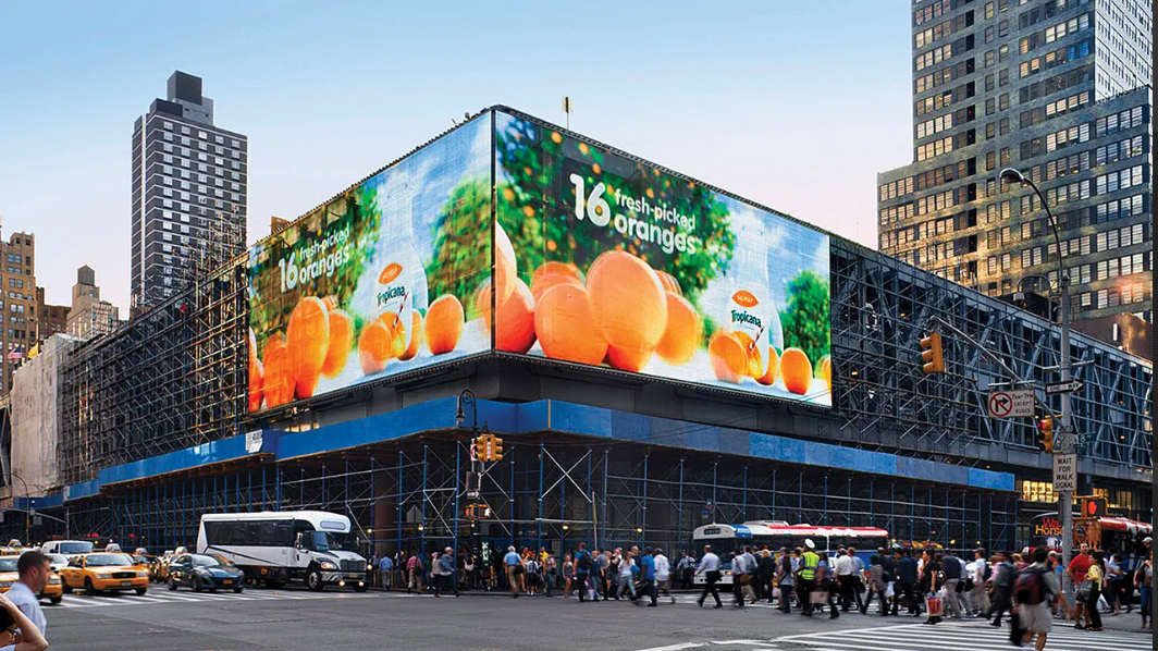 Wrap-around LED building façade